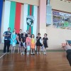 Момичетата от клуб „Яница – Т.А.“ с купа и медали от танцов турнир в Сливен